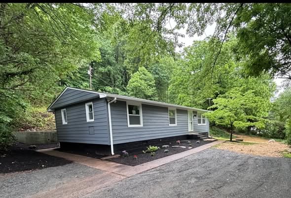 After: remodeled house exterior with new siding