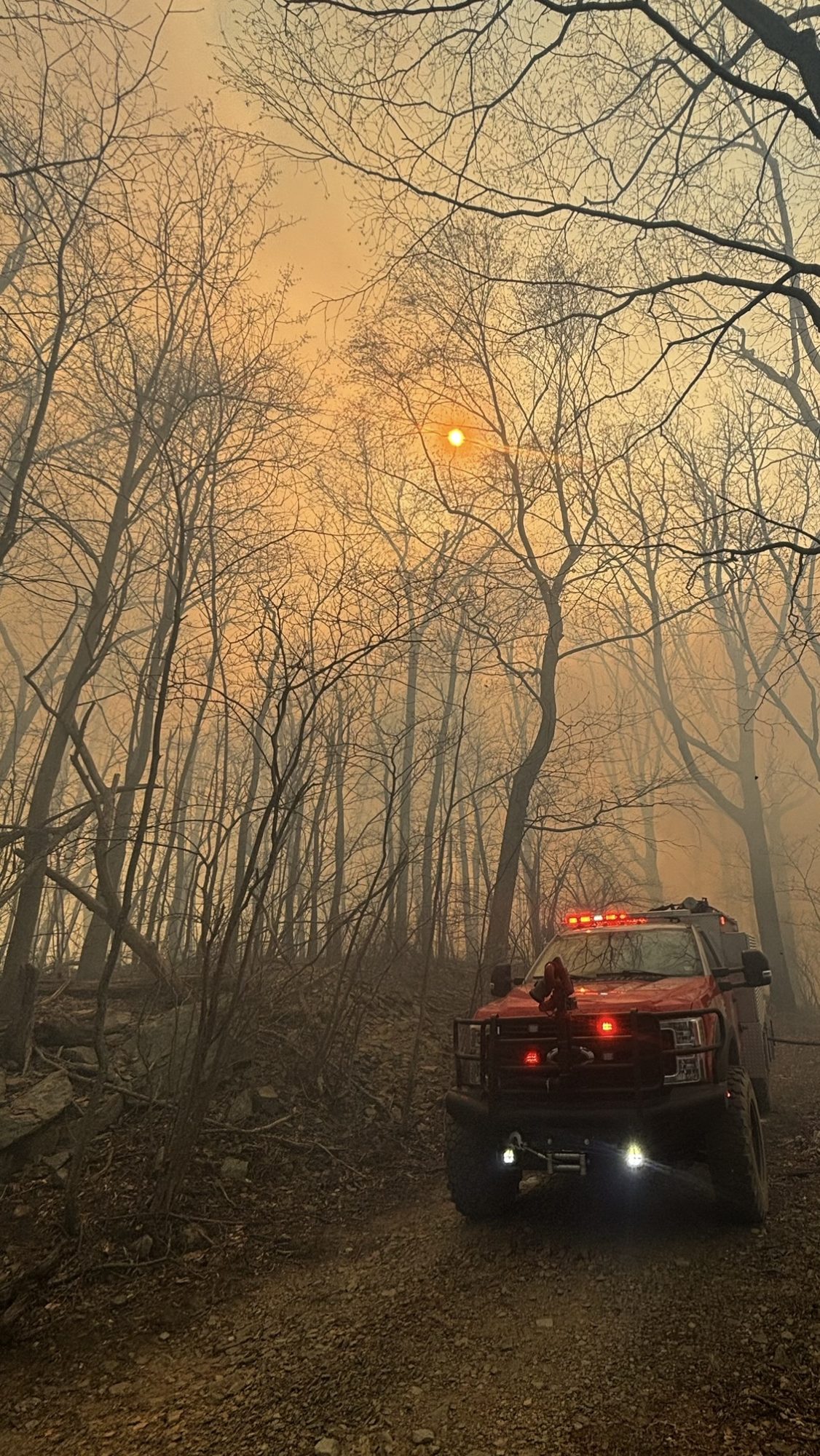 Rockfish Valley Volunteer Fire Department truck responding in smoky woods
